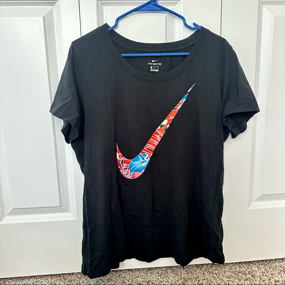 Nike Women’s black t-shirt w/ large floral swoosh
